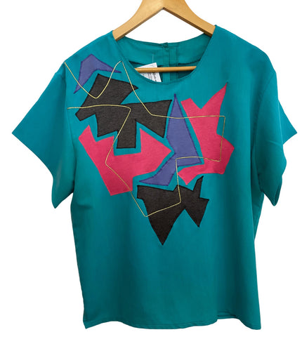 Teal Shirt with Geometric Designs