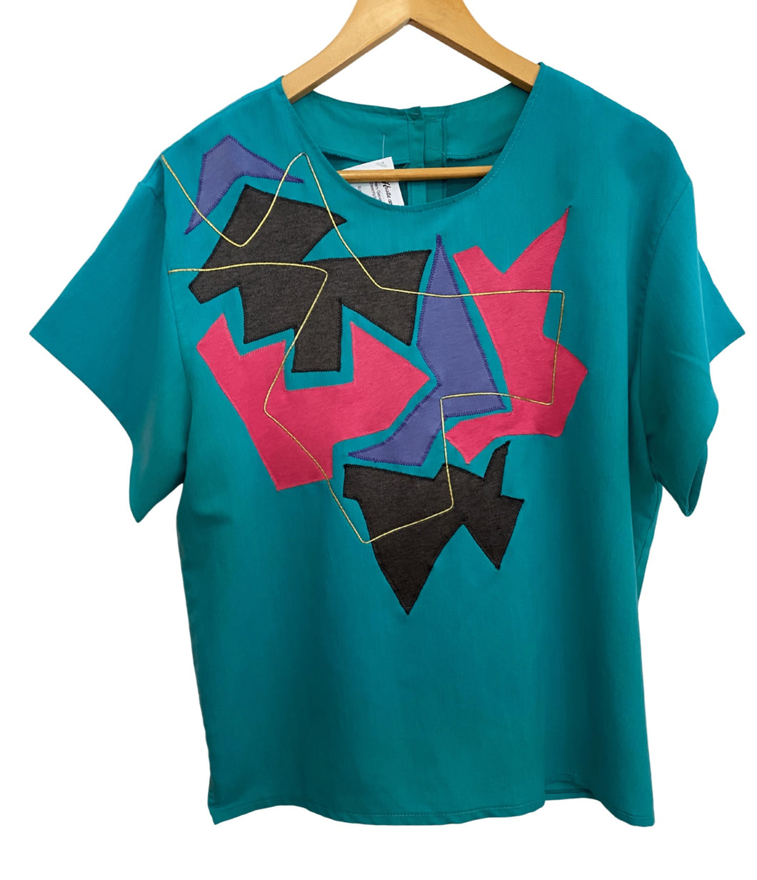 Teal Shirt with Geometric Designs