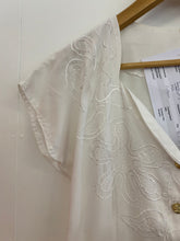 Load image into Gallery viewer, White Dress with an embroidered Pattern